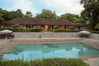 Large rectangular pool below the guest wing