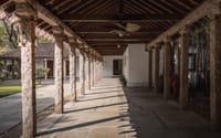 Granite colonnade along a stone veranda