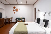 Bawa room with terracotta floor and desk