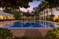 Open air swimming pool at dusk