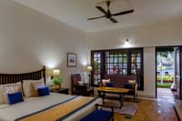Imperial room with dark wooden bed