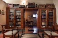 Library with glazed wooden bookcases