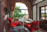 Arched window table looking to the clock tower