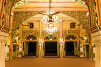 Gilded Durbar Hall interior with chandeliers