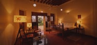 Chettinad room with teak bed