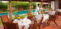 Pool cafe tables beside the pool