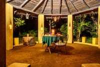 Dinner laid under the open pavilion at dusk