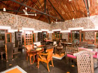 The dining room under a timber roof
