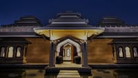 The ornate entrance gate at night