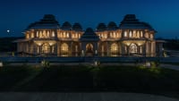 The illuminated facade at night