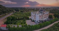 Aerial view at sunset: resort, lawns and Ranthambore road