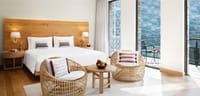 Luxury room with a view (site alt: Luxury Room with View - Banner Image of Taj Rishikesh, Uttarakhand)