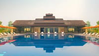 Sunlit pool deck with a tranquil ambiance