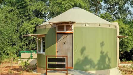 A yurt at Tathastu Kanha, green canvas on a round frame