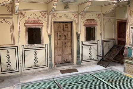 The Haveli Single Room, hand-painted in blue and red