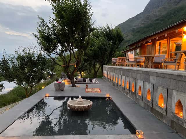Qayaam Gah infinity pool at dusk