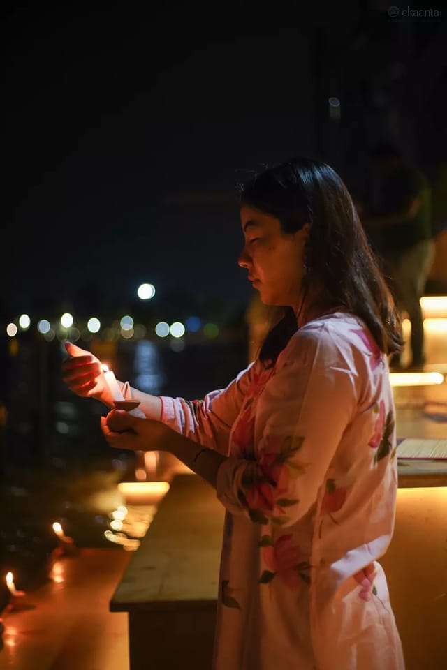 Aarti on the retreat's own ghat, and a room above the river.