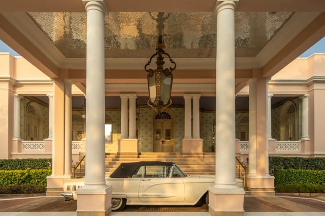 The porte-cochere at Rajmahal Palace, with the family’s 1950s Ford Thunderbird