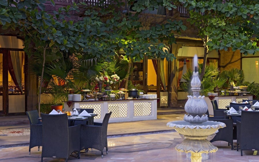 Courtyard dining by the lotus fountain at Panchranga restaurant, Ranbanka Palace, Jodhpur