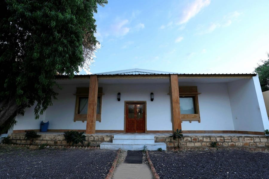 Stone cottage-style building exterior in daylight